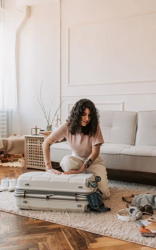 woman packing for wedding 