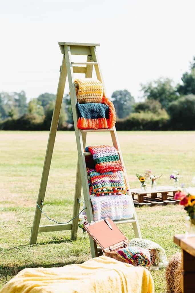 blanket ladder - comfort station for winter wedding 