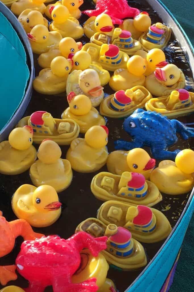 hook a duck - yellow ducks in blue bath - backyard wedding game