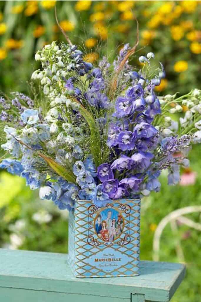 lavender flowers in a tea tine in the garden for a tea party