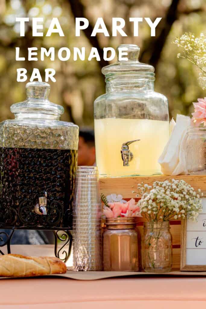 lemonade stand with drinks in large glass dispensers for afternoon tea party