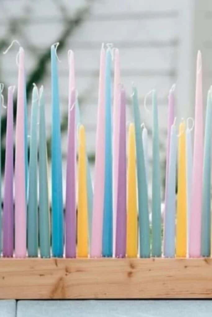 spring centerpiece idea pastel taper candles 