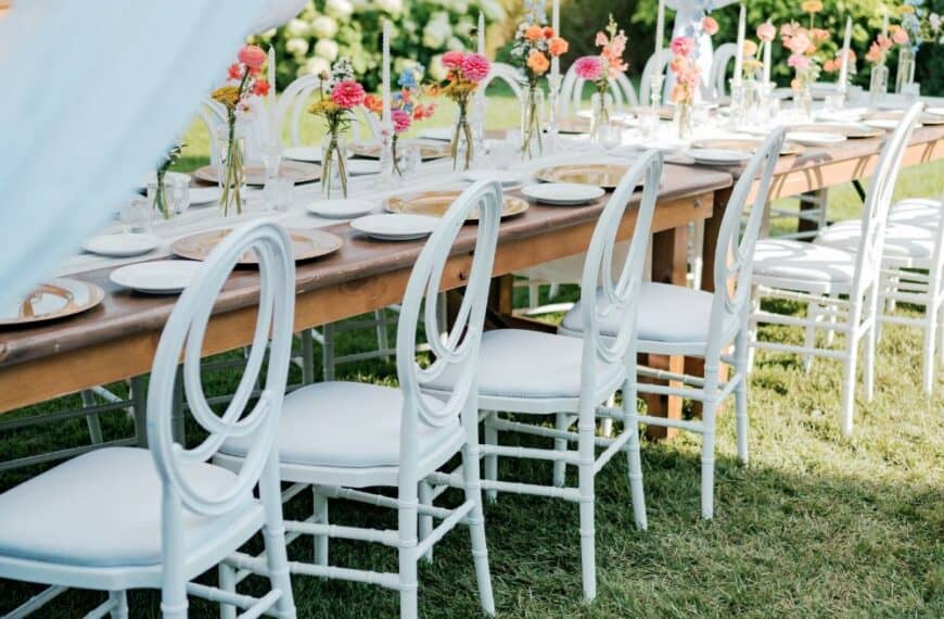 backyard wedding decor white tables with colorful florals