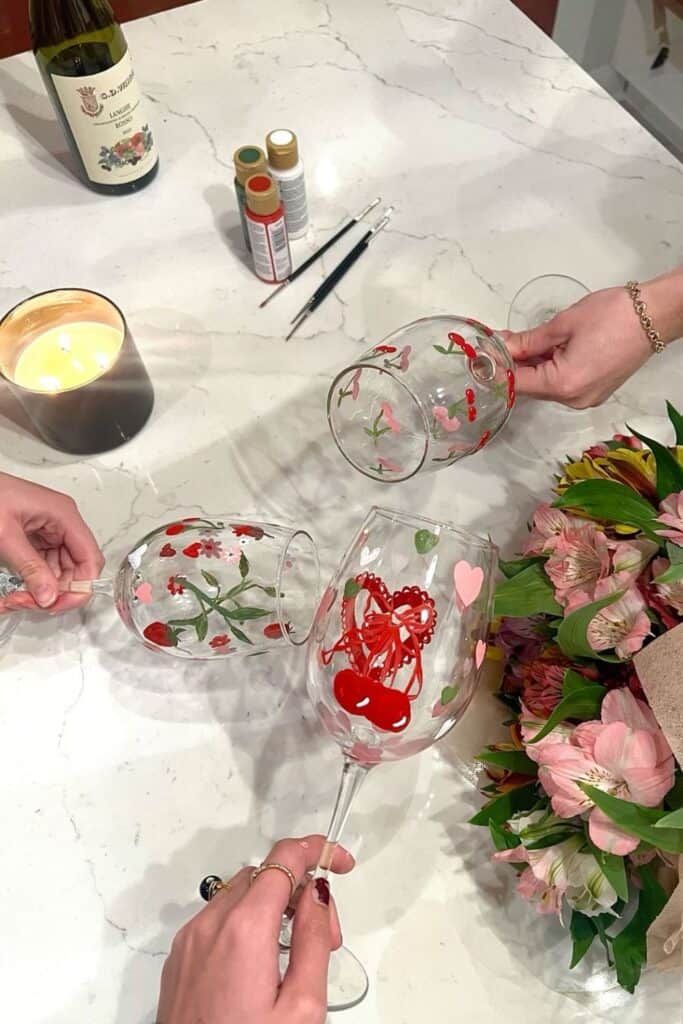 wine glasses painting activity - wine glasses painted with red hearts