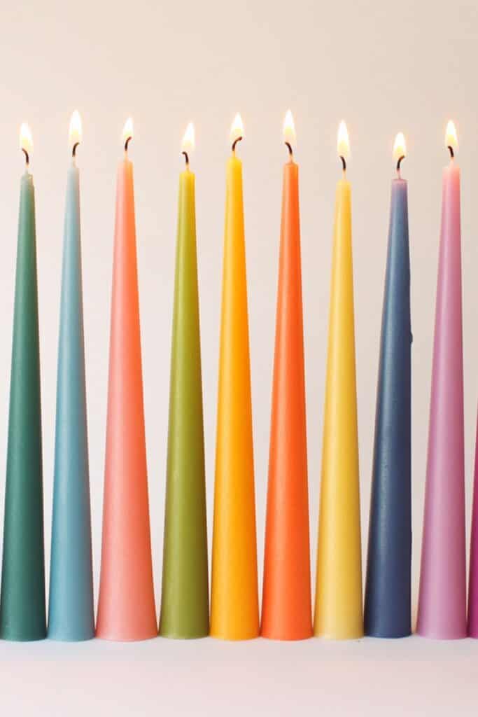 multi colored taper candles for fiesta 