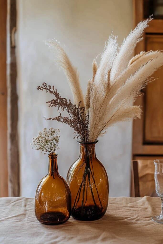 amber vases and pampas grass decor