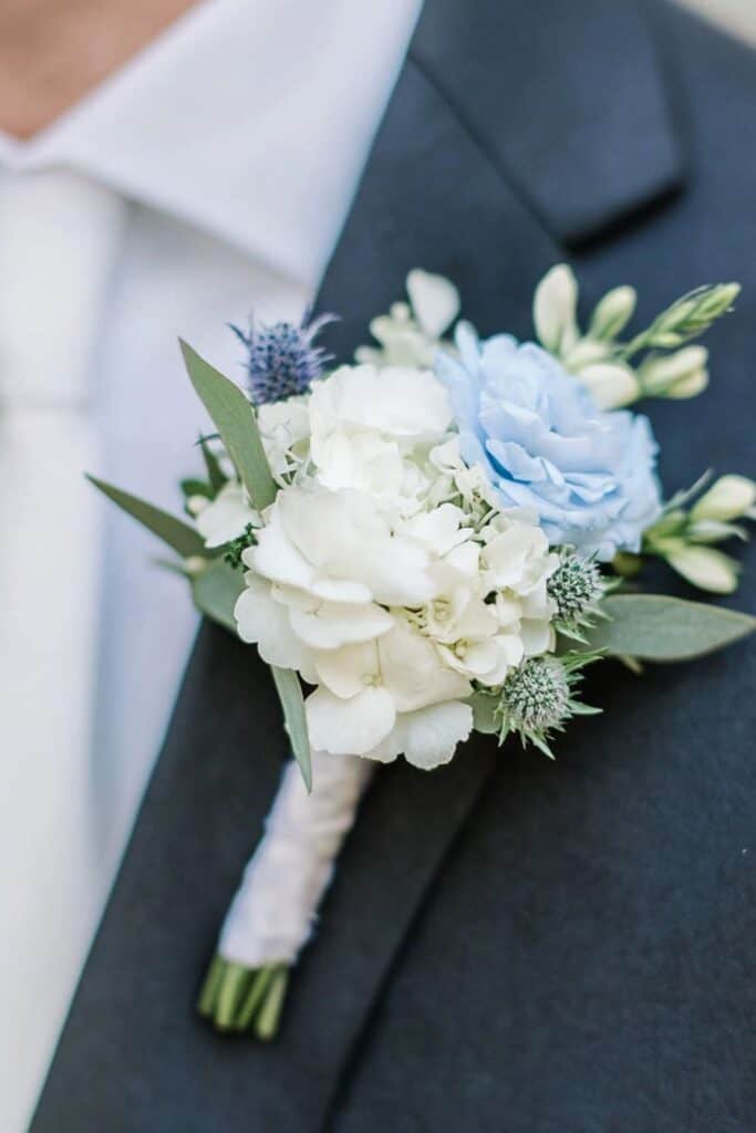 blue and white boutonniere