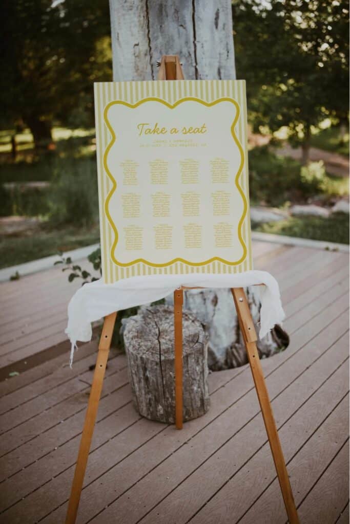 yellow seating sign for yellow wedding