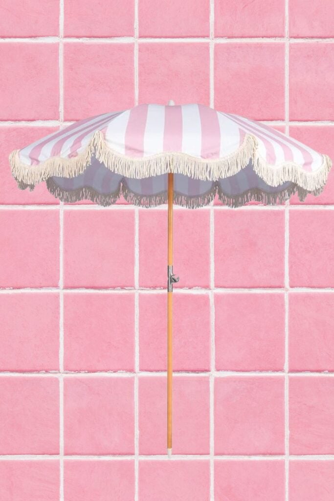 pink and orange stripped tassel umbrella