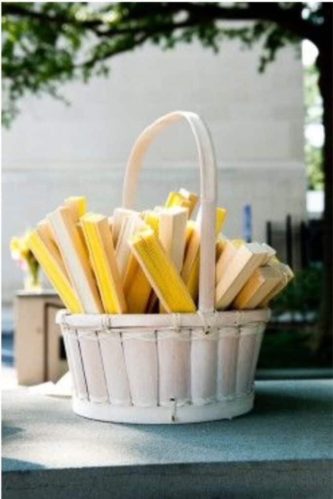 yellow paper fans - yellow wedding theme