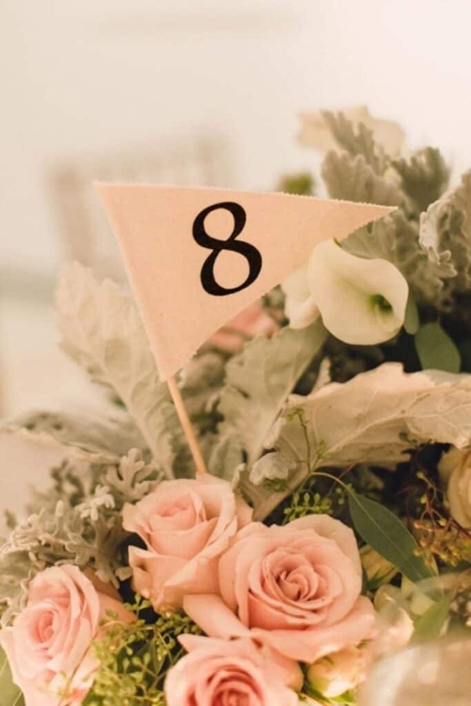 camp wedding flag table numbers