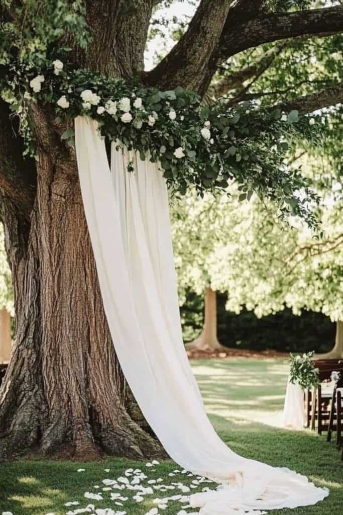 fabric drape tree wedding ceremony decor